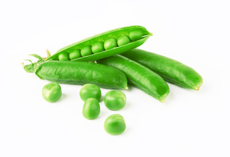 Fresh green peas isolated on white backgroundの写真素材