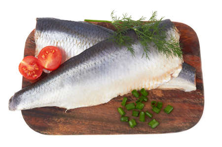 Slices of herring fish isolated on a white backgroundの写真素材