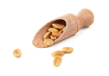 Salted peanuts isolated on a white backgroundの写真素材