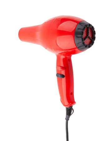 Red hair dryer isolated on a white backgroundの写真素材