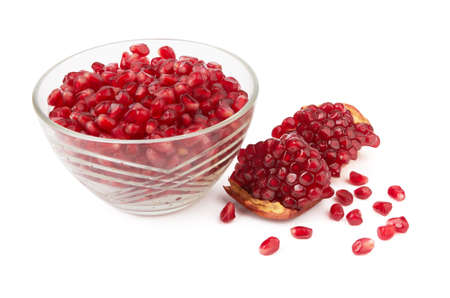 Sliced pomegranate path isolated on a white backgroundの写真素材