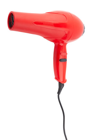 Red hair dryer isolated on a white backgroundの写真素材