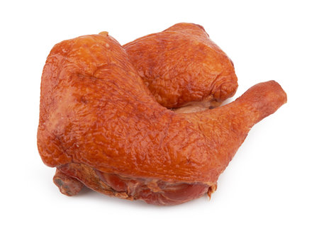 Smoked chicken thighs isolated on a white backgroundの写真素材
