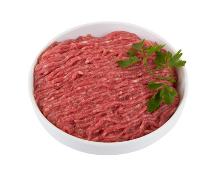 Fresh pork and beef minced meat in bowl isolated on white backgroundの写真素材