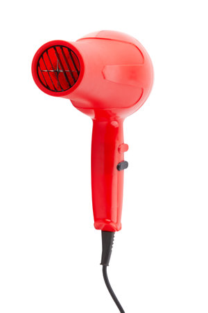 Red hair dryer isolated on a white backgroundの写真素材