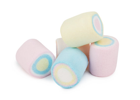 Marshmallows of different colors isolated on white backgroundの写真素材