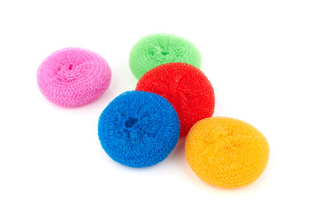 Colorful sponges for washing dishes on a white backgroundの写真素材