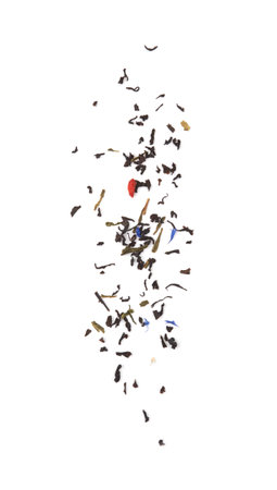 Falling dried tea leaves isolated on white background.の写真素材