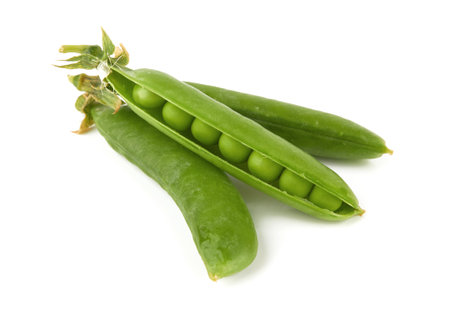 Fresh green peas isolated on white backgroundの写真素材