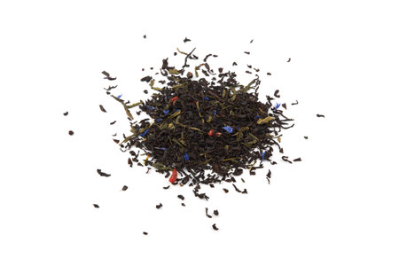 Falling dried tea leaves isolated on white background.の写真素材
