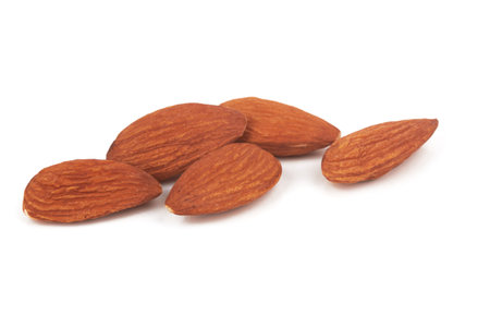 Almonds isolated on a white backgroundの写真素材