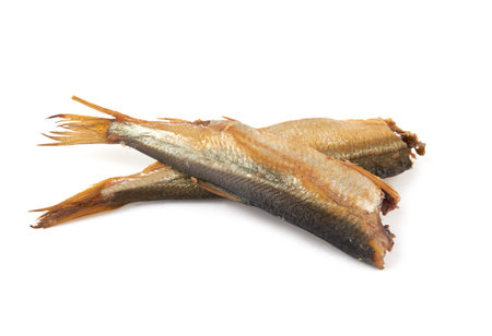 Sprats without their heads isolated on a white backgroundの写真素材