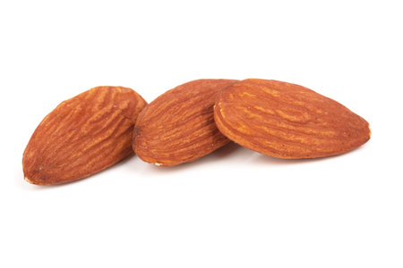 Almonds isolated on a white backgroundの写真素材