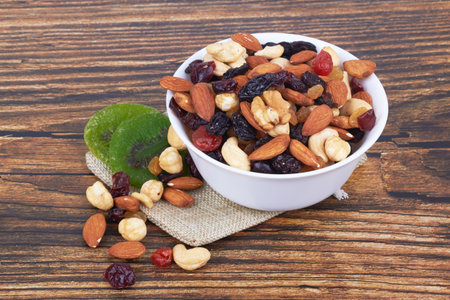 Mix of nuts on wooden backgroundの写真素材