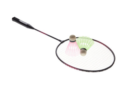 Badminton rackets and shuttlecock isolated on white backgroundの写真素材