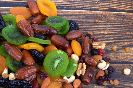 Dry fruits on a wooden backgroundの写真素材