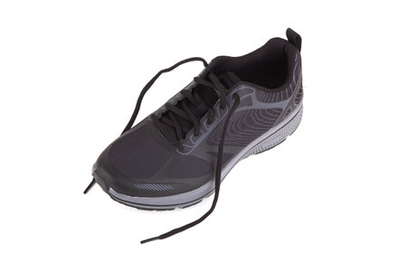 Gray sneakers isolated on a white backgroundの写真素材