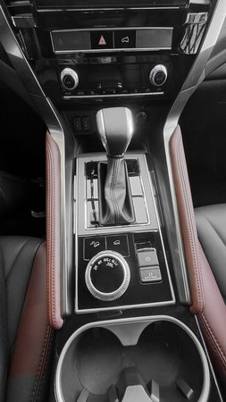 Automatic gearbox handle in a car as backgroundの写真素材