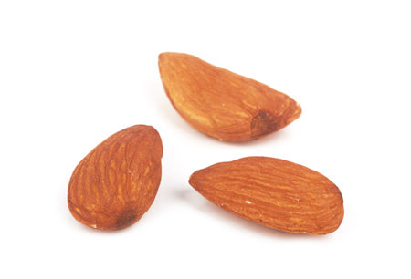 Almonds isolated on a white backgroundの写真素材