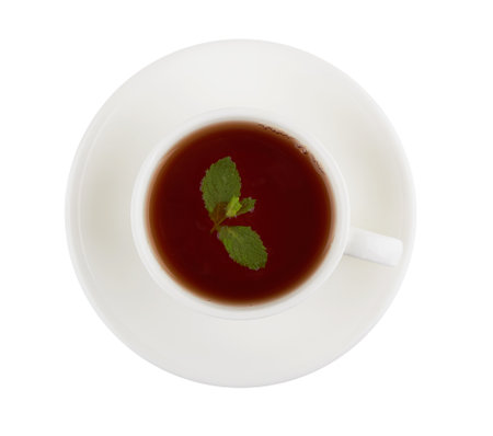 Black tea with mint isolated on white backgroundの写真素材