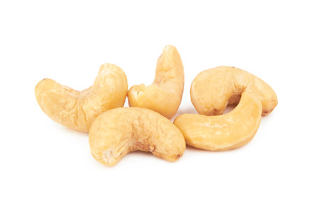 Cashew nuts isolated on white backgroundの写真素材