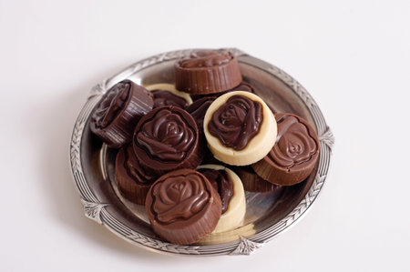 chocolate candies on white background