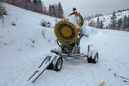 Snow making on winter slope.
