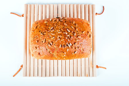 Photo of tasty pice of bread on white background