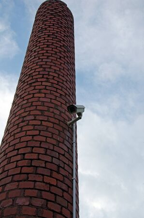 Photo of CCTV camera on chimneyの写真素材