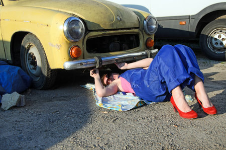 a photo of a woman car mechanic