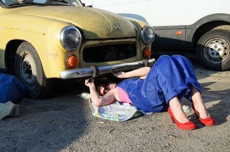 a photo of a woman car mechanicの写真素材