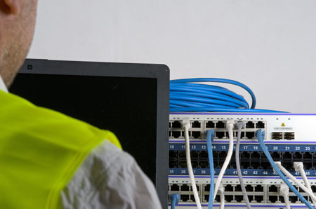 Photo of big server and wires during check-up