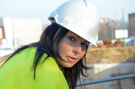 a photo of a young woman architect on the building site of the construction projectの写真素材