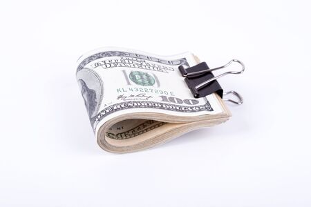 pictures of dollar banknotes on a white backgroundの写真素材
