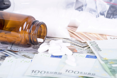 photo of the drugs, cocaine , money and gun