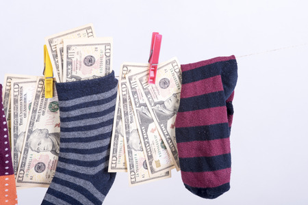 dollar savings hidden in a sockの写真素材
