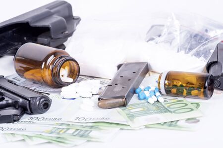photo of the drugs, cocaine , money and gunの写真素材