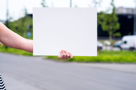 photo of a woman on the outside with an empty white card
