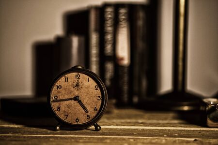 old alarm clock on backgroundの写真素材