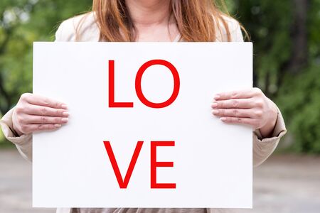 a photo of a woman with a piece I love youの写真素材