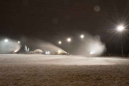 Snow cannon at night.の写真素材