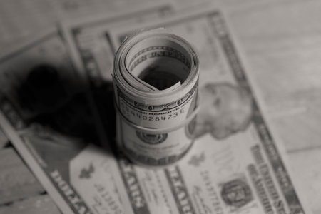 dollar bills tied with rubber band