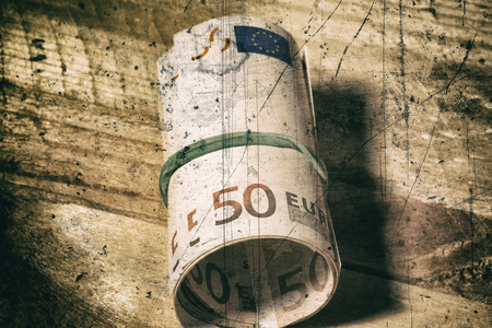 Euro bills tied with rubber bandの写真素材