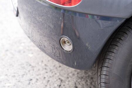 car at gas station being filled with fuelの写真素材