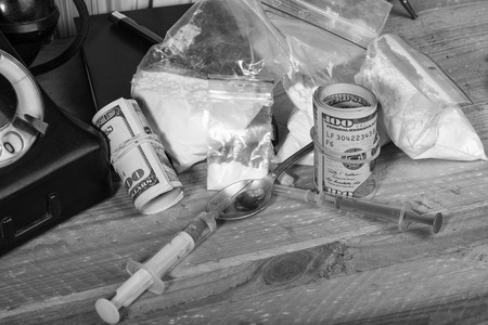 Drug syringe and cooked heroinの写真素材