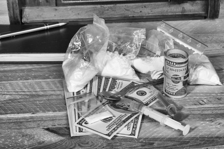 Drug syringe and cooked heroinの写真素材