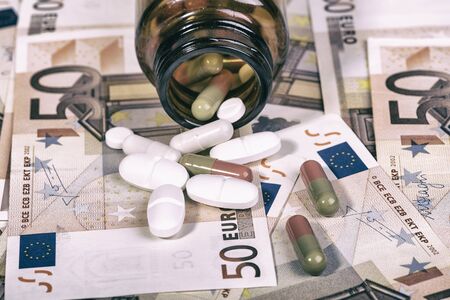 pills on euro billsの写真素材