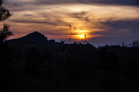 Sunset in the mountains. View from the top of the mountain.の写真素材