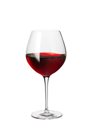 Glass of red wine isolated on whiteの写真素材