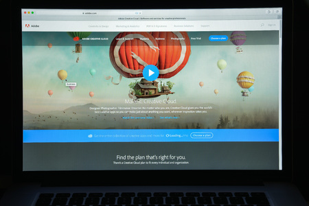 Milan, Italy - August 10, 2017: Adobe website homepage. Adobe logo visible.のeditorial素材